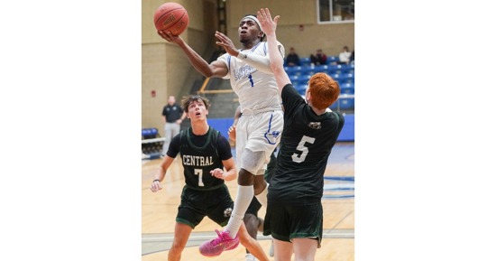 MCC’s Dave Olaniyi gets the critical putback after his second offensive rebound to give MCC a late lead Tuesday against Central Community College.